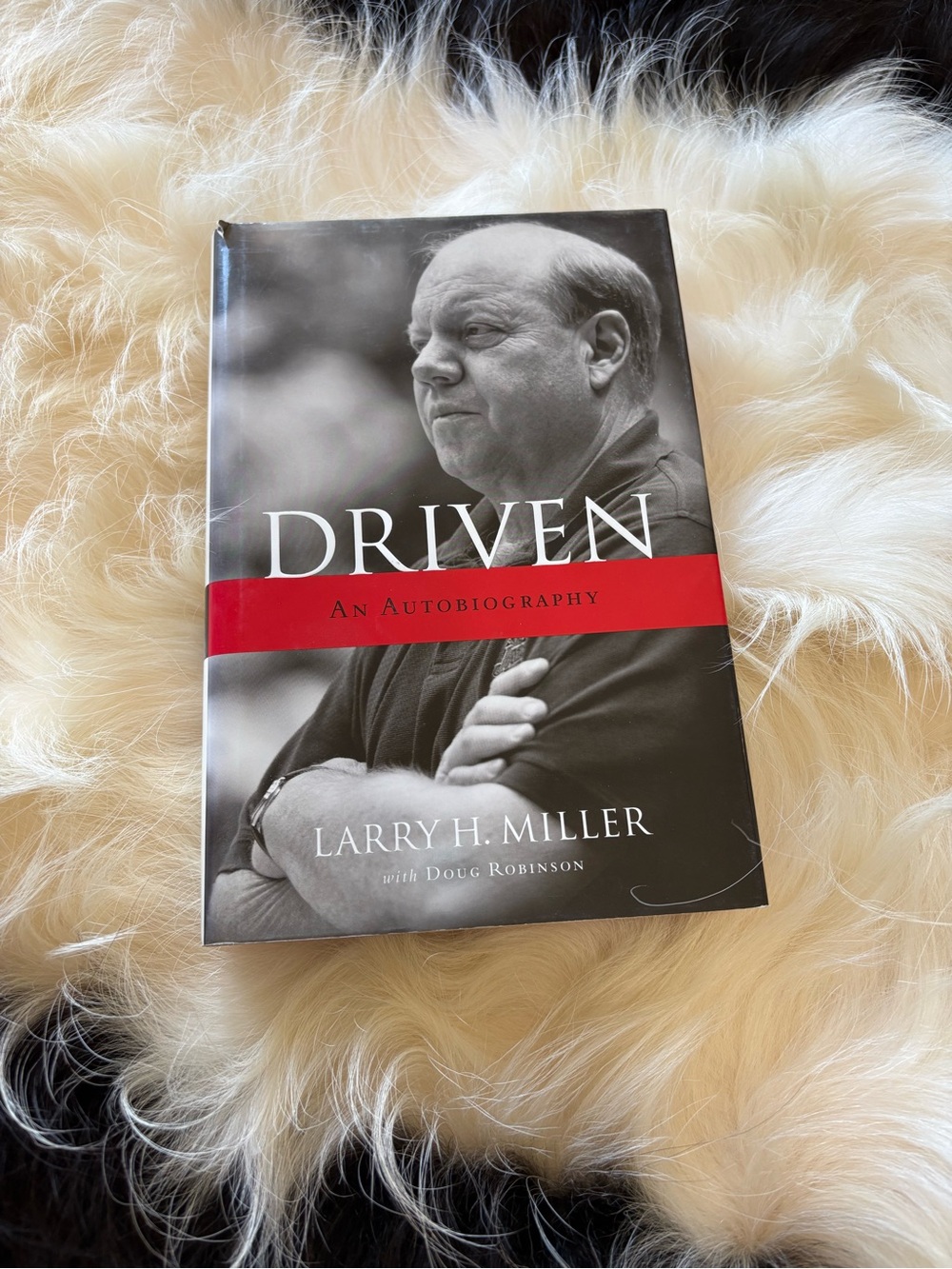 Driven: An Autobiography by Larry H. Miller - Black, White & Red Hardcover